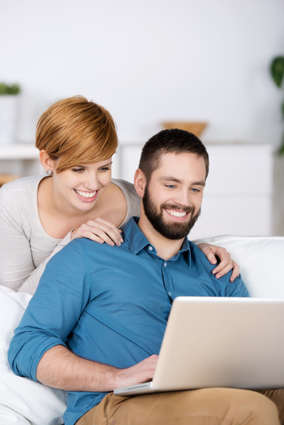 Happy Young Couple With Laptop - Фото, зображення