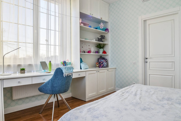 Interior of a teenage girl room in blue and white colors  - Fotografie, Obrázek