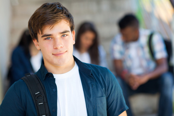 highschool boy with friends on background - Фото, зображення