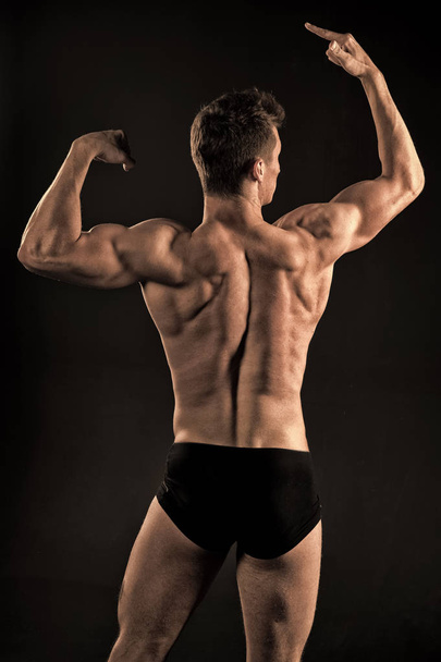Sportsman with strong hands, biceps, triceps. - Foto, Bild