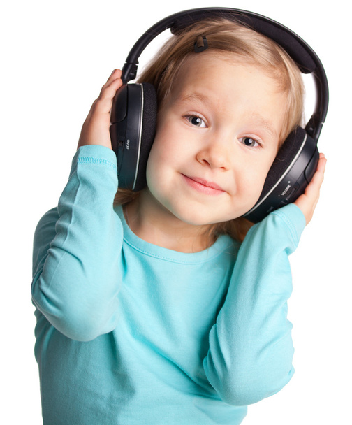 Little girl in headphones - Photo, image