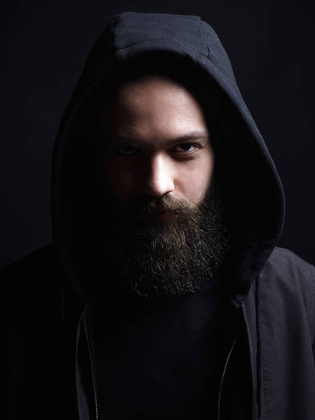 Bearded Handsome Man in Hood. Boy in a hoodie - Photo, Image
