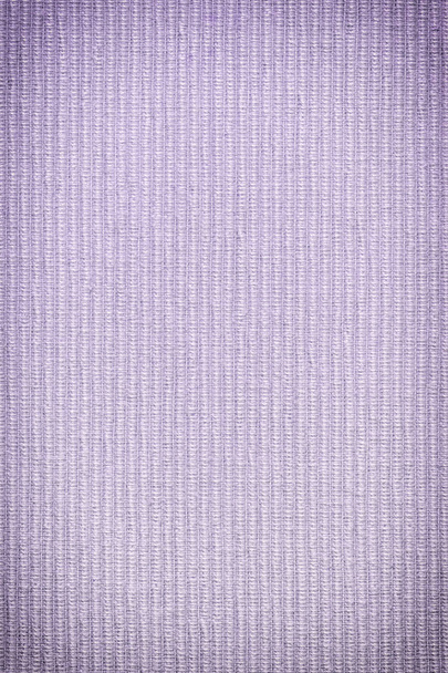 Плотная тканая текстура из ребра. Крупный план из обивочной ткани. Пустой фиолетовый фон для макетов с виньеткой
. - Фото, изображение