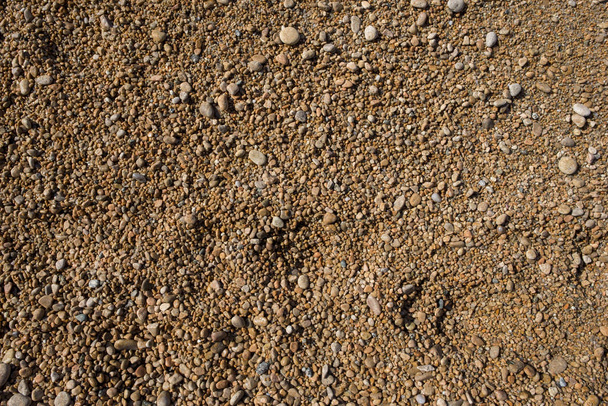 Sfondo di piccole e marroni pietre da spiaggia
 - Foto, immagini