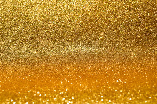 Soyut altın parıltılı arkaplan parıltıları - Fotoğraf, Görsel