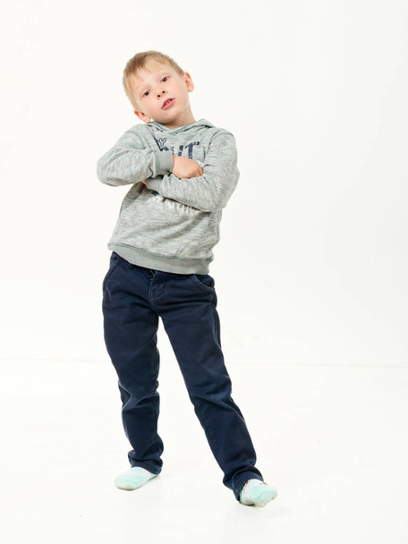 portrait of a cheerful boy on a white background - Photo, Image