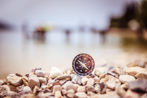 Compass on the beach, small stones, text space - Photo, Image