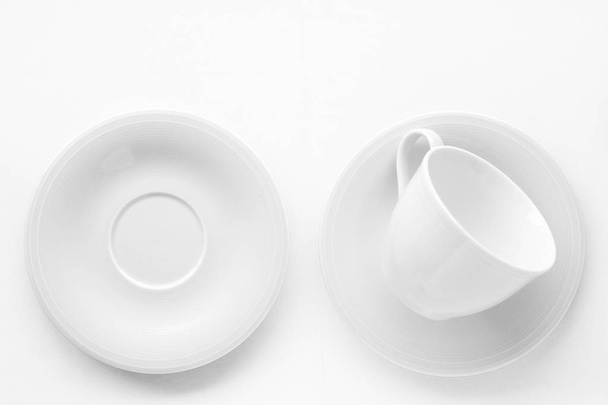 Empty cup and saucer mockup on white background, flatlay - Photo, Image