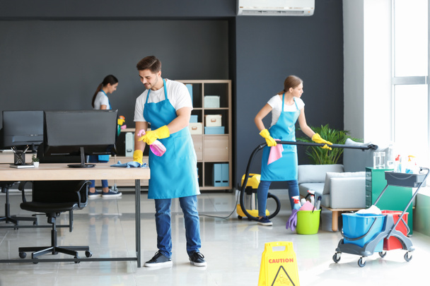 Team of janitors cleaning office - Photo, Image