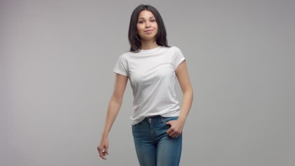 young mixed race woman in studio in casual look - Footage, Video