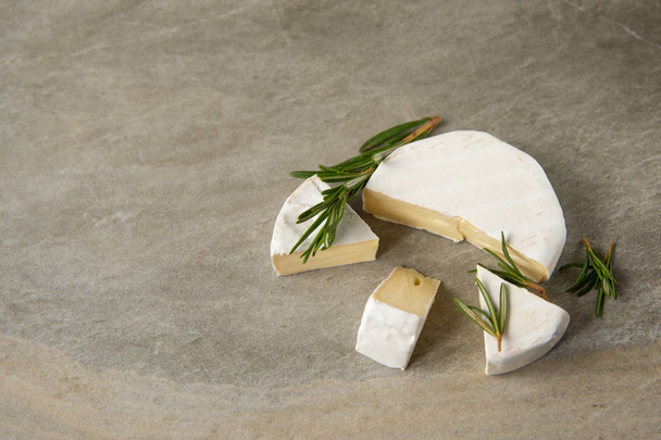 Cheese camembert or brie with fresh rosemary - Photo, Image