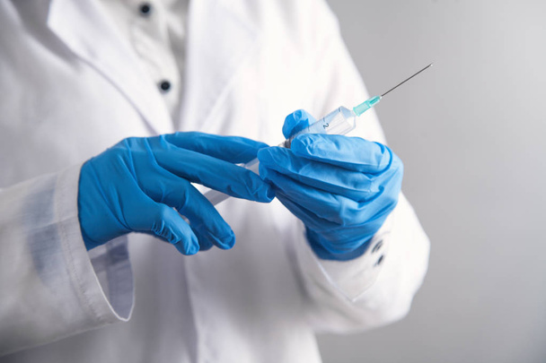 Doctor holding syringe. Healthcare and medical  - Photo, Image