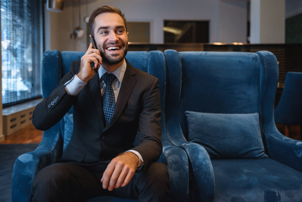 Handsome young businessman wearing suit - Fotografie, Obrázek
