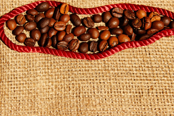 Coffee Seeds Over Textile Background. Abstract Drink Background. Ingredients For Morning Drinks.  - Photo, Image