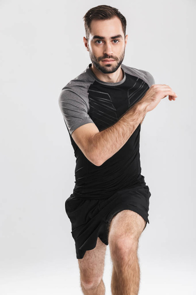 Confident motivated sportsman running - Fotó, kép