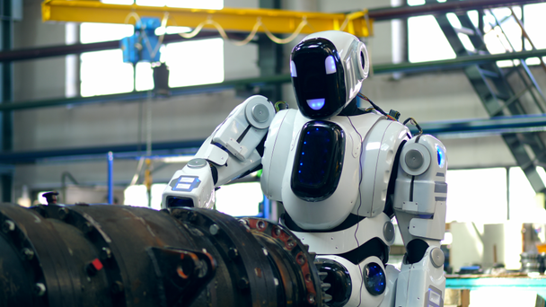 Detalle de metal industrial está siendo perforado por un robot
 - Imágenes, Vídeo