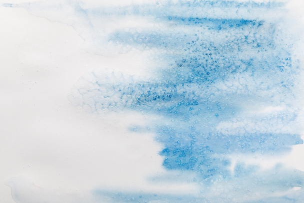 blue watercolor paint spill on white textured background with copy space - Foto, Bild