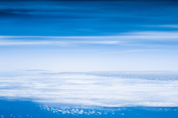 Blue sky background, white clouds and bright sunlight - Φωτογραφία, εικόνα