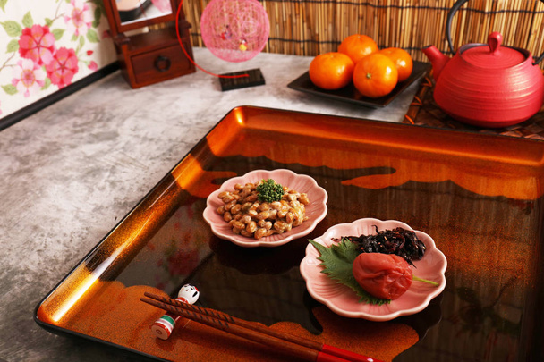 Delicious Japanese cuisine on a wooden tray - Photo, image