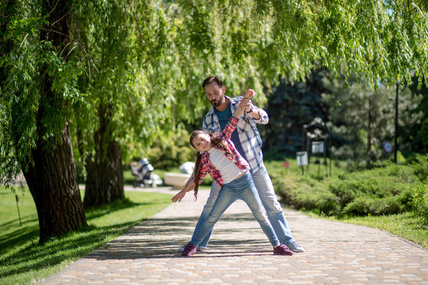Adorable father and daughter have fun together - Fotoğraf, Görsel