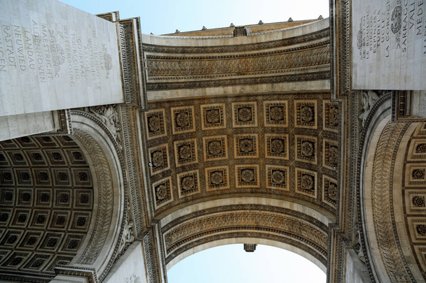 Bottom View of triumphal arch also called Arc de Triomphe in fre - Photo, Image