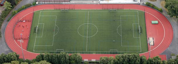 Atletiek sportfaciliteit en voetbalveld - Foto, afbeelding