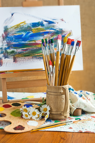 Paints and brushes in the composition - 写真・画像