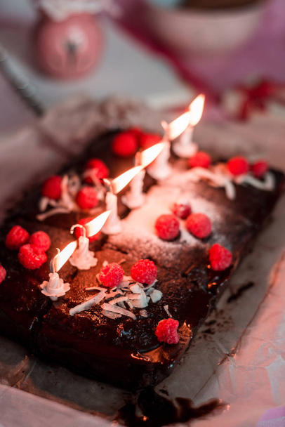 tasty homemade chocolate birthday cake decorated of some raspber - Foto, Imagen