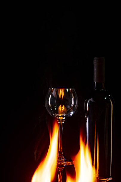 bottle of wine on fire - Photo, image