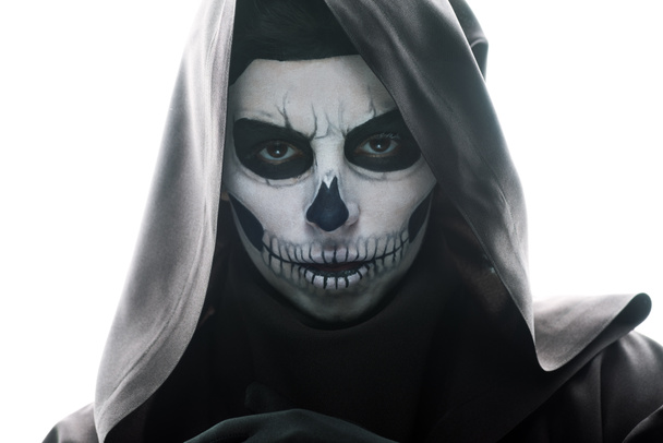 front view of woman with skull makeup looking at camera isolated on white - Foto, Imagem