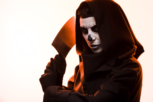 woman in death costume holding cleaver isolated on white - Fotoğraf, Görsel