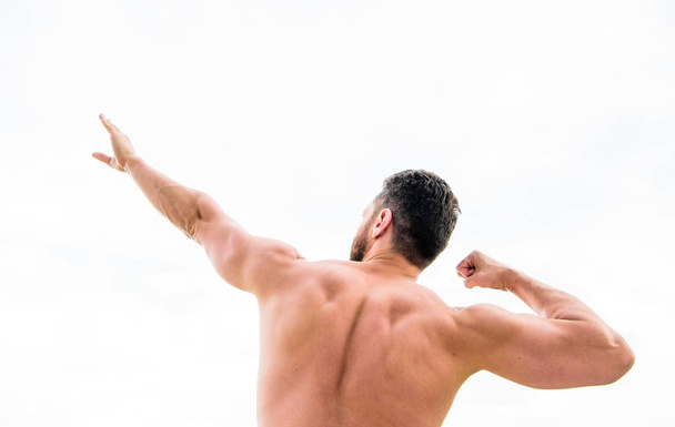 Sexuality and moving concept. Athlete with bare torso. Fitness and sport. Healthy lifestyle concept. muscular back man isolated on white. Man motivated ambitious likes win and success - Photo, image