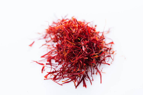 Close-up of saffron spice on white background - Photo, Image
