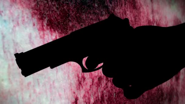 Sylwetka pistoletu przeciwko krwawej koncepcji przestępstwa w tle - Materiał filmowy, wideo