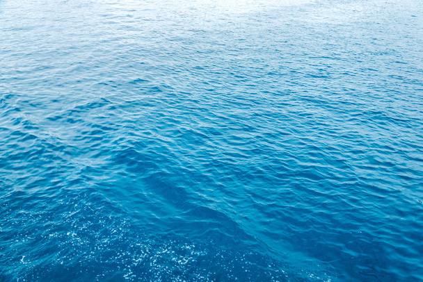 textúra kék tenger, vagy óceán víz full-frame - Fotó, kép