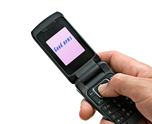 Téléphone portable avec étiquette "Bonne nouvelle" sur son écran
 - Photo, image