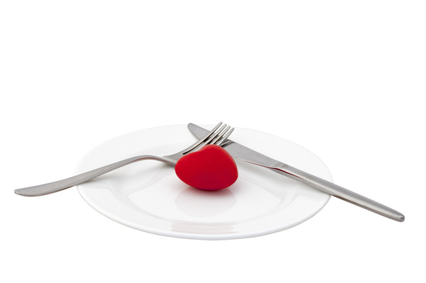 Red heart on plate with white background - Φωτογραφία, εικόνα