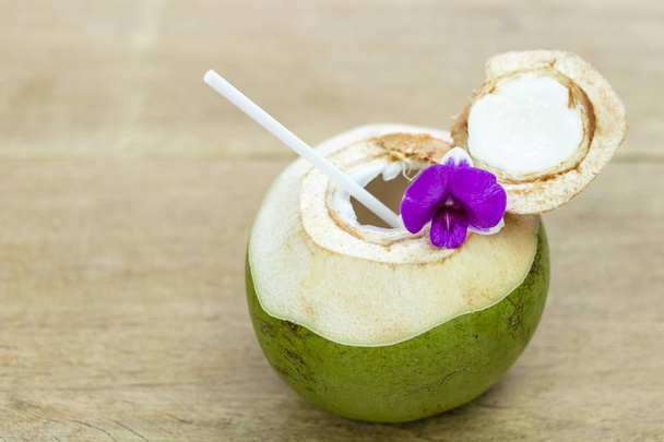 Raw White Young Coconut Drink with a Straw - Photo, Image