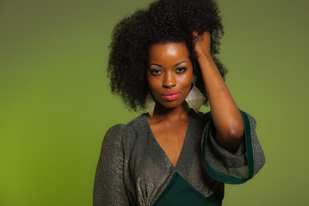 Sensual retro seventies fashion afro woman with green dress. Gre - Photo, Image