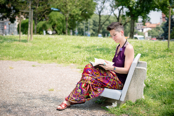 beautiful hipster short hair woman in the park - Photo, Image