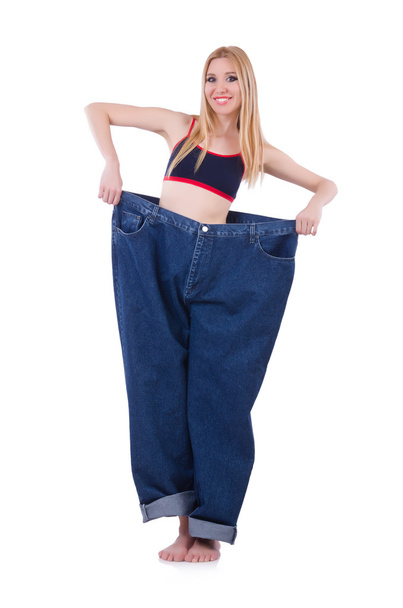 Dieetconcept met oversized jeans - Foto, afbeelding