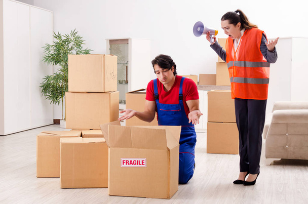 Professional movers doing home relocation  - Photo, Image