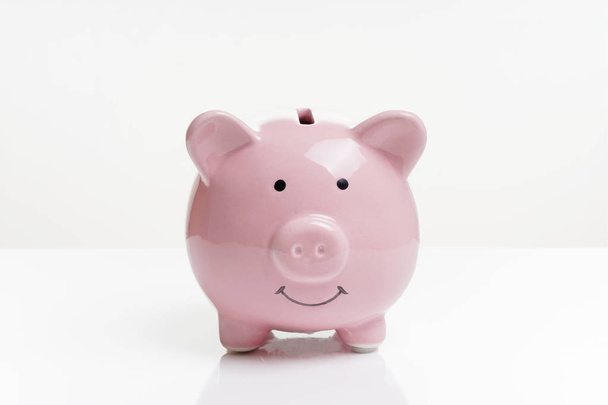 piggy or coin bank or piggybank or money box - Foto, afbeelding