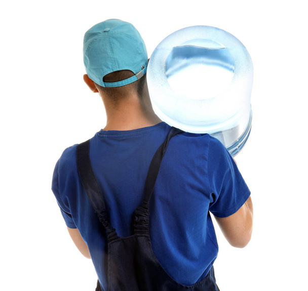 Delivery man with bottle of water on white background - Foto, afbeelding