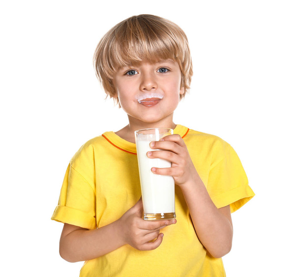 Cute little boy with glass of fresh milk on white background - Photo, Image