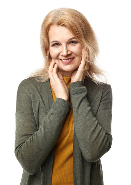 Portrait of beautiful mature woman on white background - Fotoğraf, Görsel