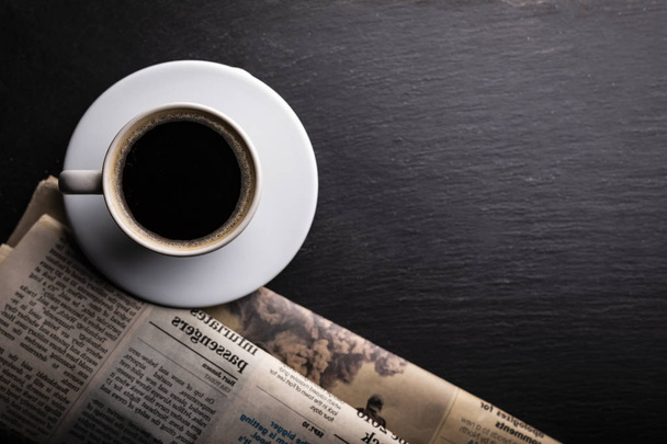 Coffee and newspaper. Relax with a cup of aromatic coffee. - Fotoğraf, Görsel