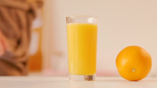 woman glass fresh smoothie orange breakfast habit - Imágenes, Vídeo
