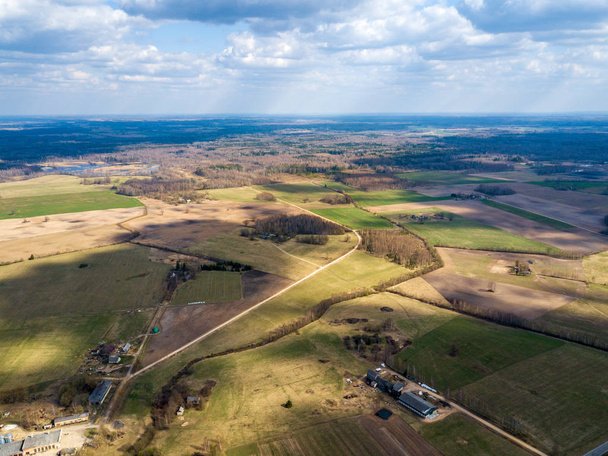 aerial view of country roads and small village with houses and l - Фото, зображення
