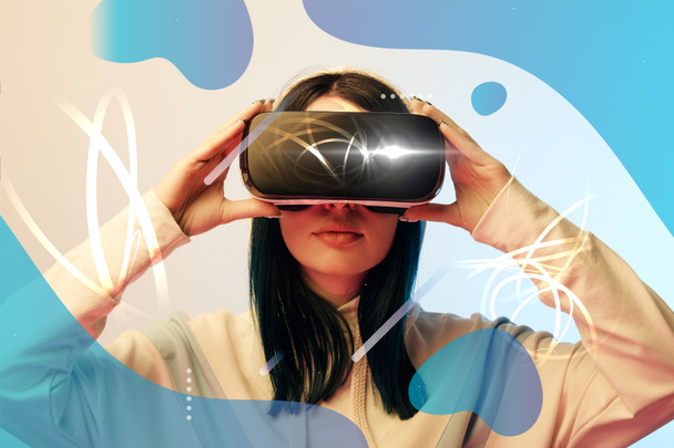 young woman in virtual reality headset with glowing cyber and abstract blue illustration on beige background - Φωτογραφία, εικόνα
